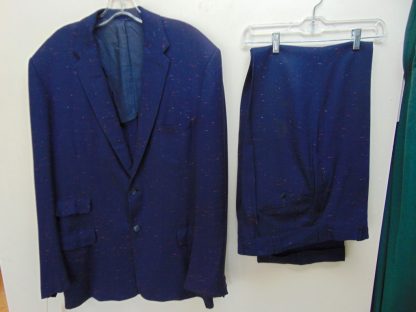 s5t78	1950's	Purple W/ Red Snowflake design Rayon Gabardine Single Breasted medium weight Vintage suit Chest size 48 inches	$600