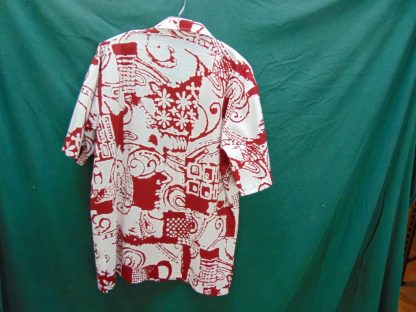 s67h29	1960's	Tapa block print covered buttons polyester  vintage Hawaiian shirt Chest size 46 inches 	$20 - Image 3