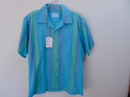 s6s95	1960's	Vertical Striped two pocket perma press Chest size 44  inches vintage shirt	$30