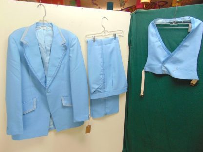 s7t16	1970's	Vintage Deadstock Powder Blue Polyester with Ribbon trim Single Breasted medium weight suit Chest size 43 inches	$250