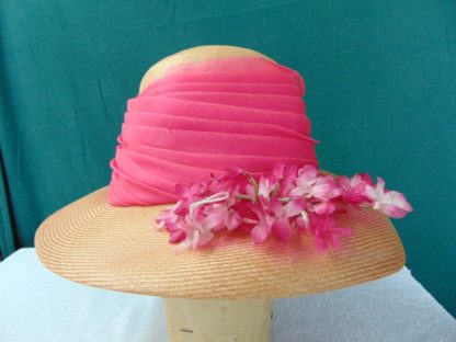 wh2	  Vintage Womans Floppy Summer Hat size (est.6 5/8) front to back  7in. side to side  6 1/4in. Brim  4in. Crown 5 1/4in.	$8 	the pink flowers dyed through underneath