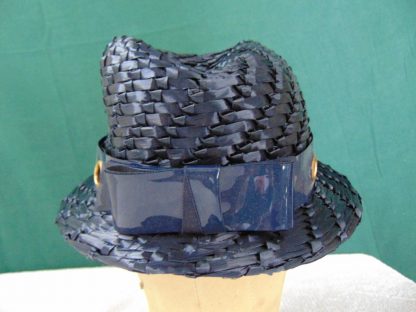 wh34	 Vintage Womans Hat  size (est.7) front to back  7 1/4in. side to side  6 3/4in. Brim  in. Crown 3 1/2in.	$15