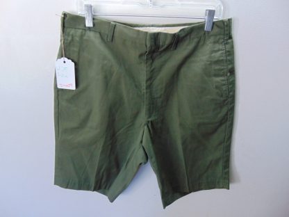 sns29	1950-60's	Vintage Solid Green Shorts perma press blend on waist think black ink from tag	$30 	Waist 35in.  Length 20in.