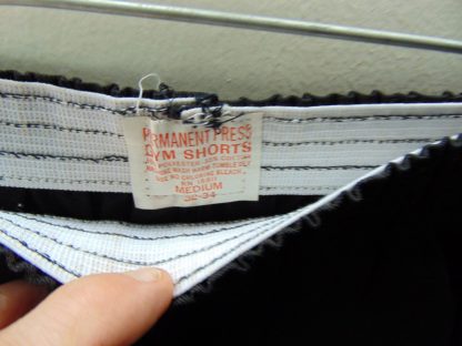 sns46	1960-70's	 Vintage Black Gym Shorts perma press blend	$30 	Waist 24/34in.  Length 13in. - Image 4