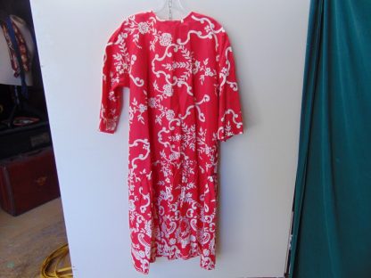 ww29	1960's	Vintage Womens Hawaiian print Dress or Mumu material feels like plastic	$20 	stain on lower front