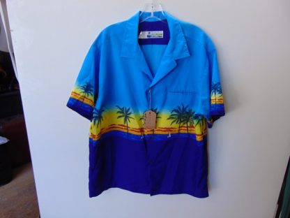 s67h234	1970's	Beach Sunset border print polyester vintage Hawaiian shirt Chest size 48 inches 	$20 	changed buttons are cool